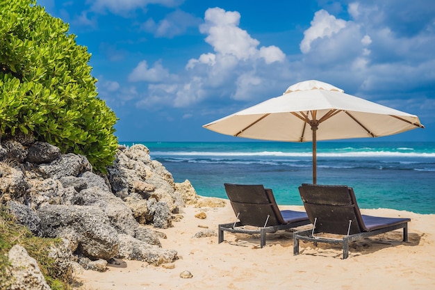 Two beach chairs on the tropical vacation