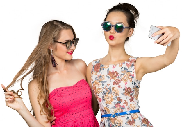 Two beautiful girls making selfie