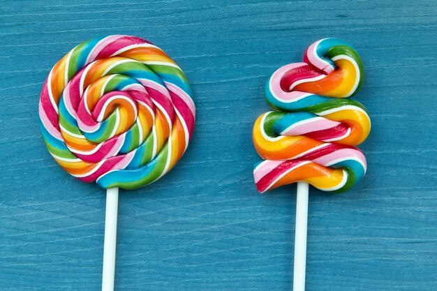 Two beautiful lollipops with many colors 