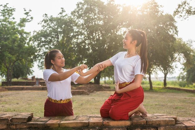 Two Beautiful young girl Thai Dancing art