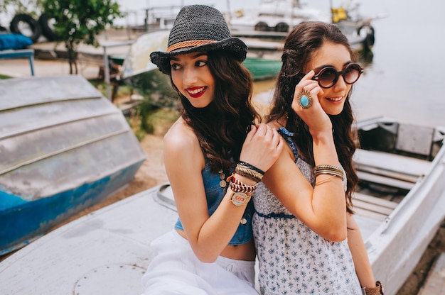 Two beautiful young women making selfie 