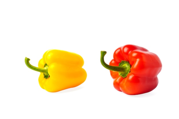 Two bell peppers isolated on a white background.