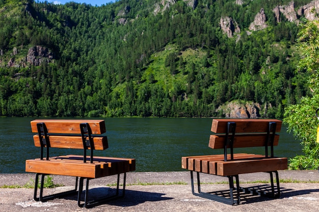 Two benches on the shore in summer