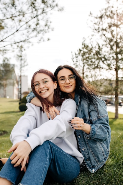 Two best friends smiling spending time outdoors