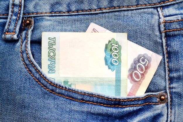 Two bills of Russian rubles in the front pocket of jeans