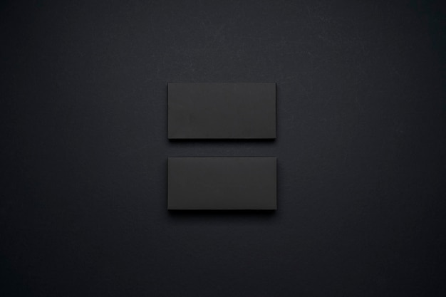 Two black boxes mockup display on black background