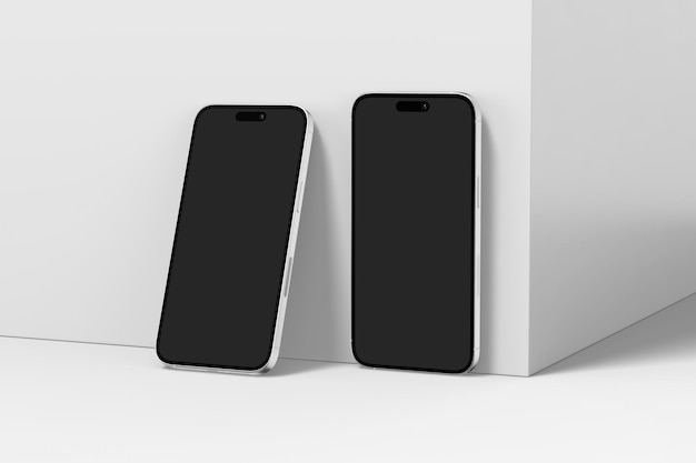 Photo two black cell phones side by side on a white background.