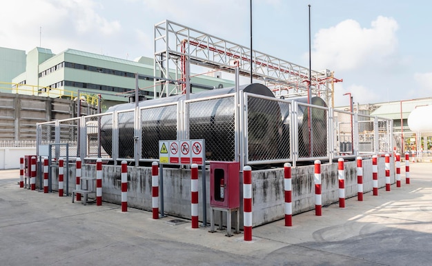 Two black fuel oil tanks are used for industrial plants