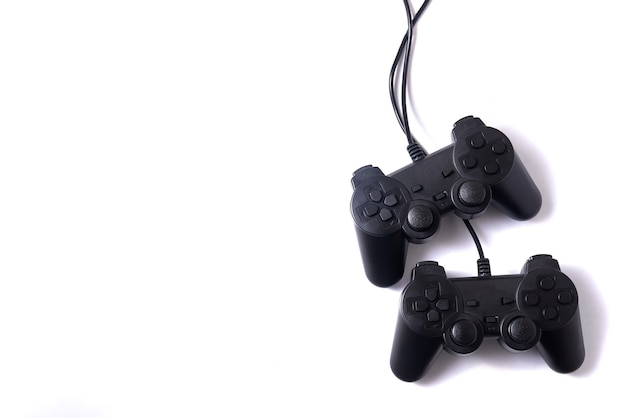 Two black joysticks on a white background