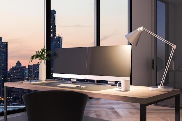 Two blank black computer screens on office desktop in interior\
with night city view corporate template mock up 3d rendering