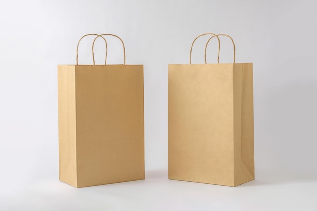 Photo two blank paper cardboard container packs for commercial shopping