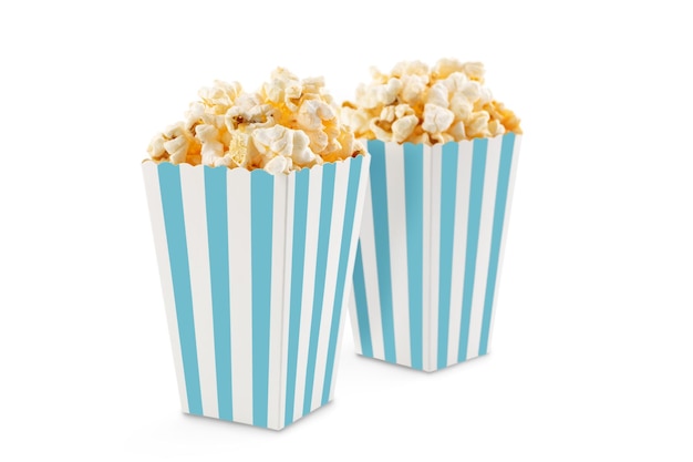 Two blue white striped carton buckets with tasty cheese popcorn isolated on white background