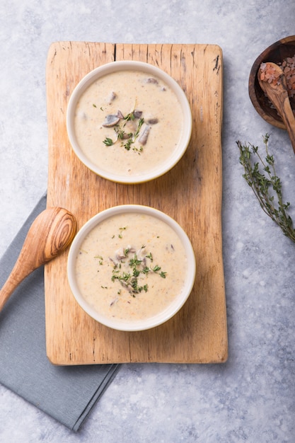 A two bowls of delicious homemade cream of mushroom soup.