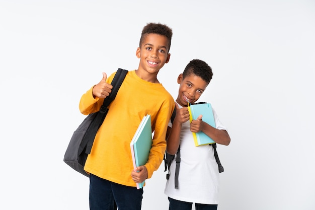 Two boys African American students over isolated  and with thumb up