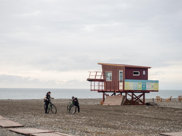 Two boys on bikes on the beach Sports Beach in spring