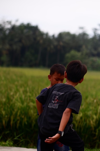 Two boys in a field