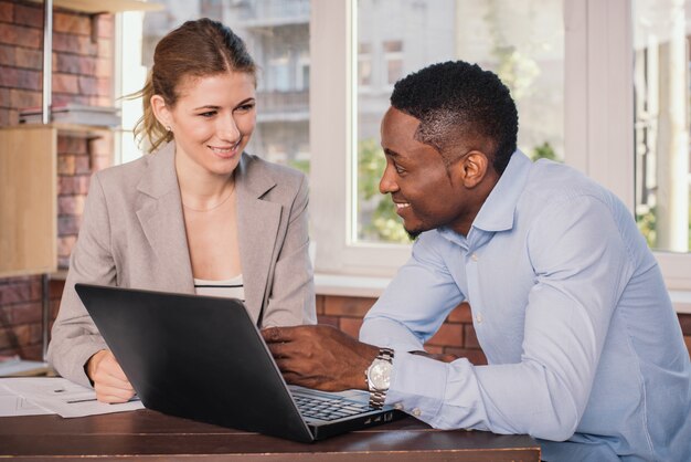 Two business people working together