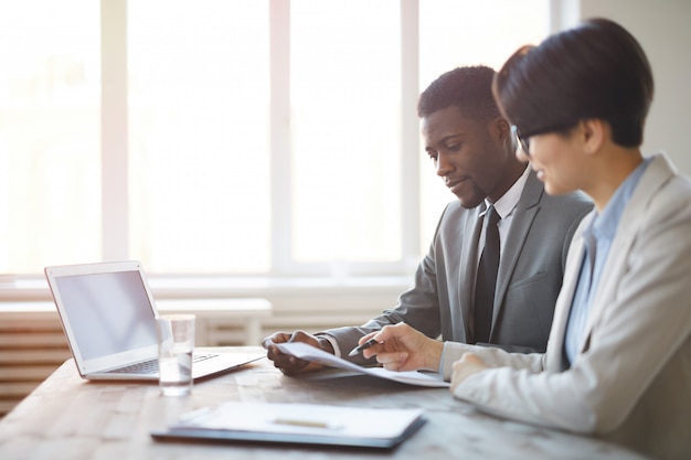 Two Business People Working