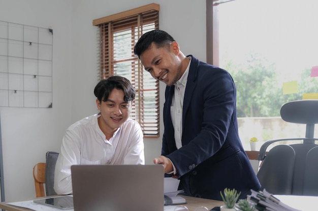 Two Business working at office with documents on desk meeting to planning analyzing the financial report business plan investment finance analysis concept