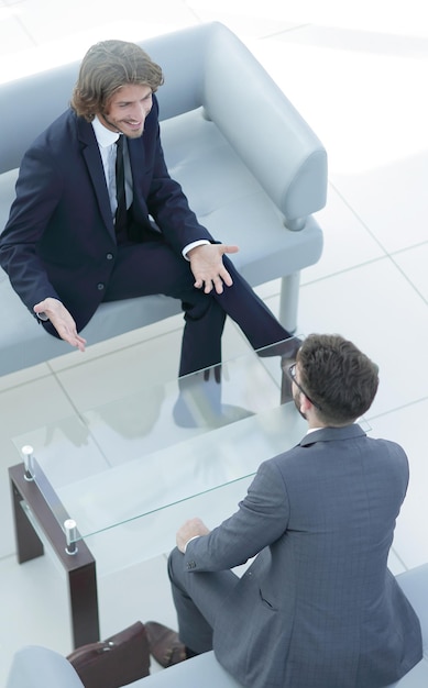 Two businessmen discussing in the workplace