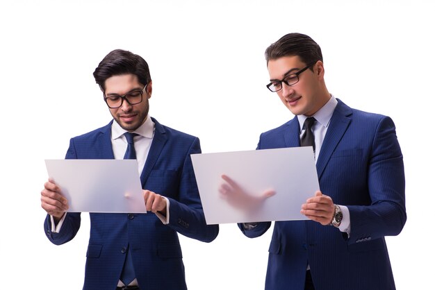 Two businessmen with virtual tablets isolated