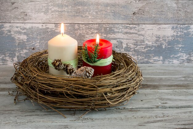 Two candles in a bird nest