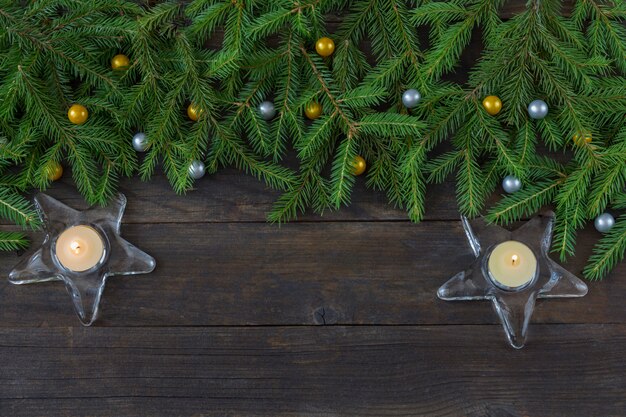  two candlesticks in the form of a star with a candle