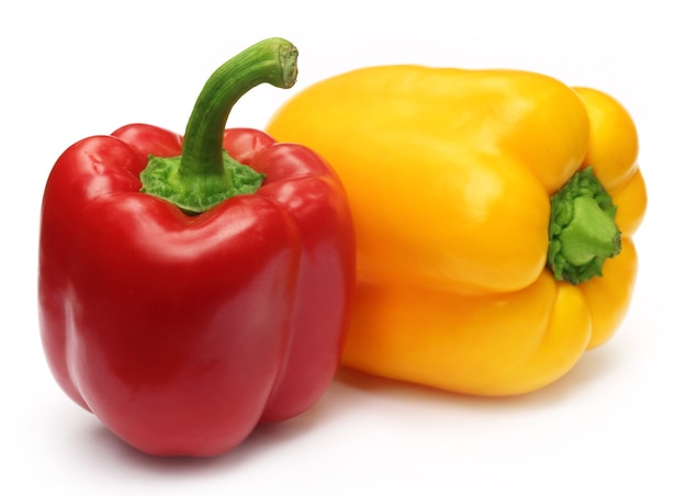 Two Capsicums over white background