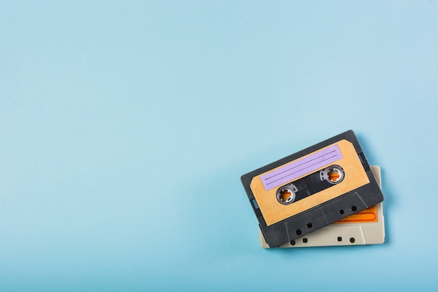 Photo two cassette tapes on blue background