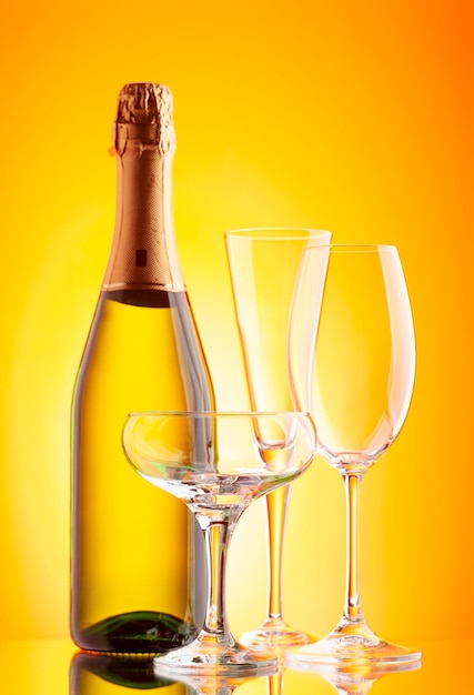 Two champagne glasses and bottle