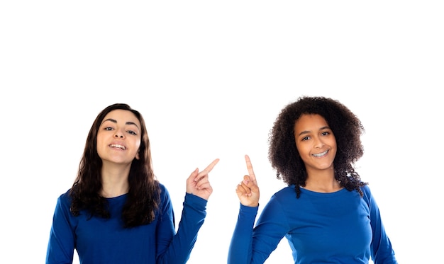 Two cheerful women friends girls isolated on a white background