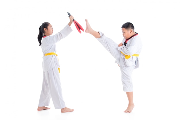 Two children having taekwondo training