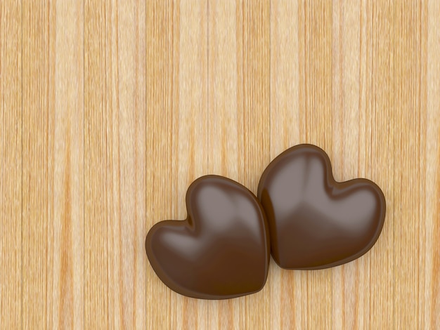 Foto due cuori di cioccolato su legno