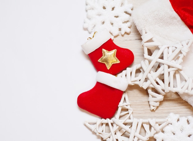 Two christmas stockings with wooden stars and copyspace