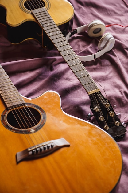 Two classic guitar in bed