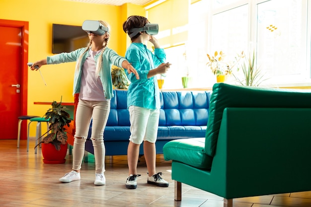 Two classmates walking together in virtual reality