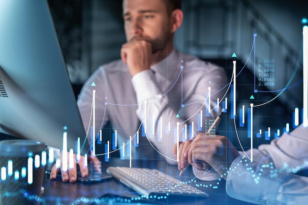 Two colleagues in formal wear working together to optimize trading strategy at corporate finance fund Forex chart hologram over modern office background