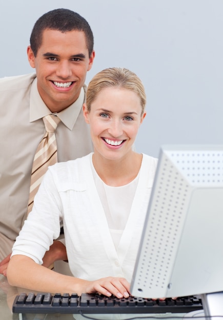 Two colleagues working at a computer