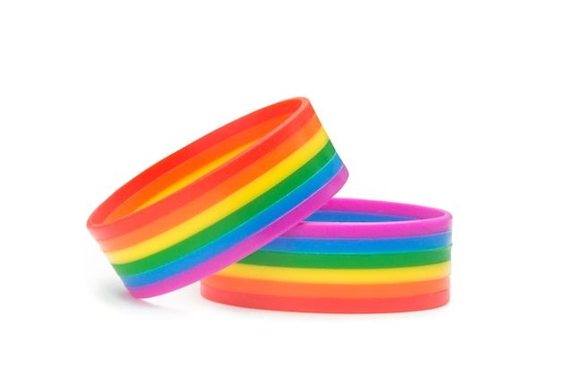 Premium Photo | Two colorful rainbow wristband lgbtq people symbol are ...