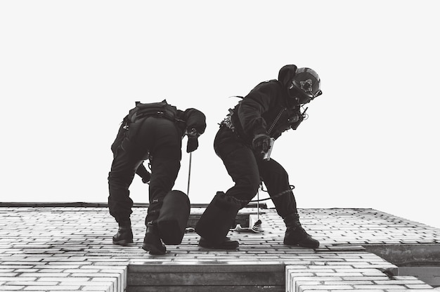 Two commandos train at the base