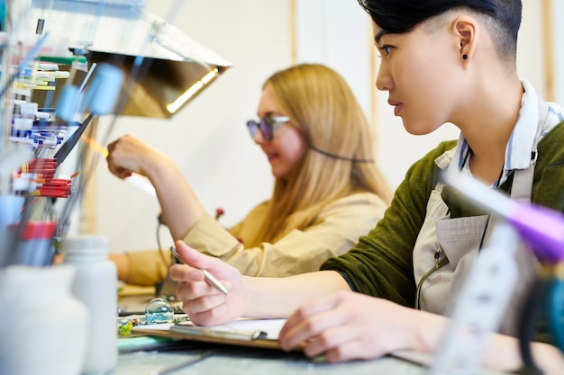 two creative women in workshop