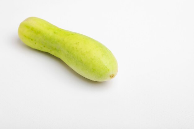 Two cucumbers on an isolated white background