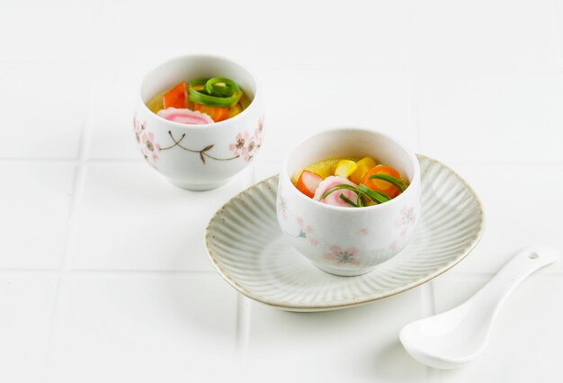 Two Cup Chawan Mushi Japanese Steamed Egg on White Table background