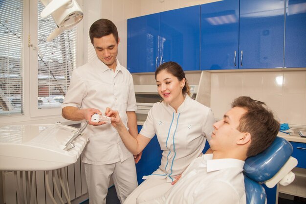 Two Dental Doctors Discussing a Patients Complicated Case