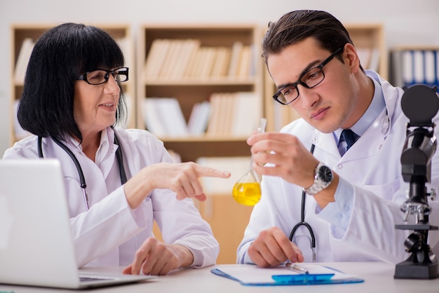 Two doctors working in the lab