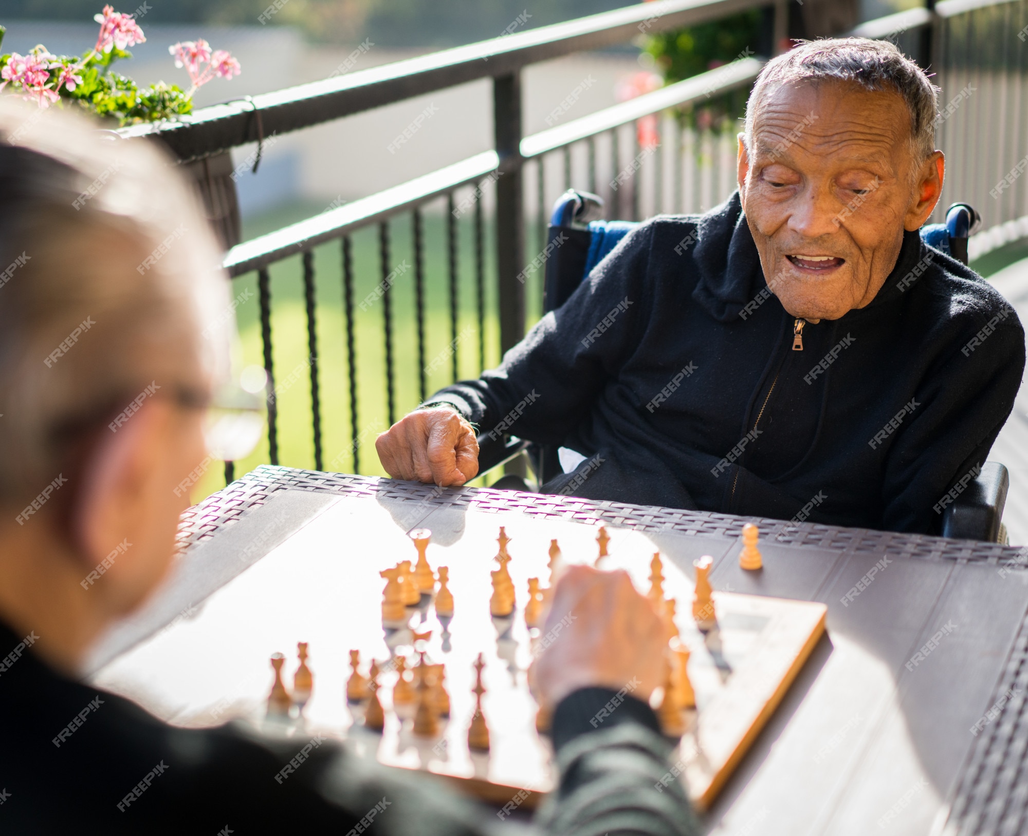 friends playing chess, Stock image