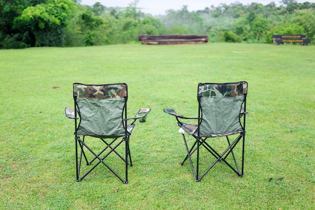 Two empty folding chairs for outdoor camping