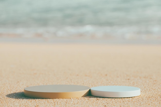 Two empty round platform podiums on the beach sand