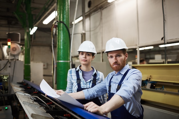 Two engineers in the factory