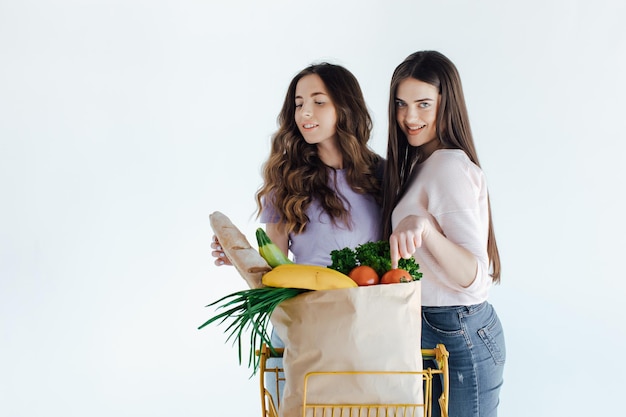 Two european girls having fun after shopping